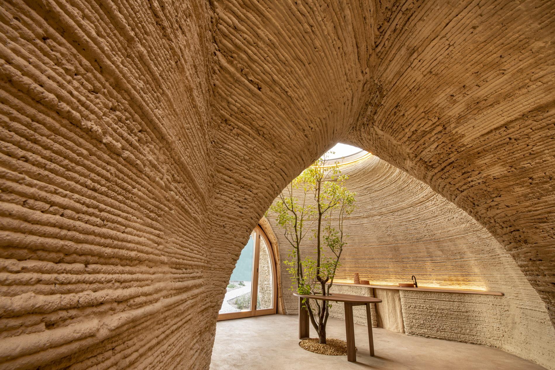 Das TECLA Haus: von MCA - Mario Cucinella Architects und WASP
